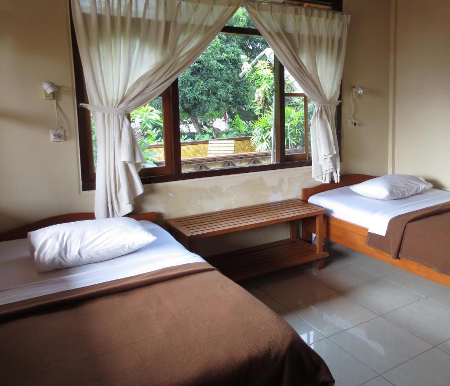 Paradise Palm Beach Bungalows And Dive Center تولامبين الغرفة الصورة